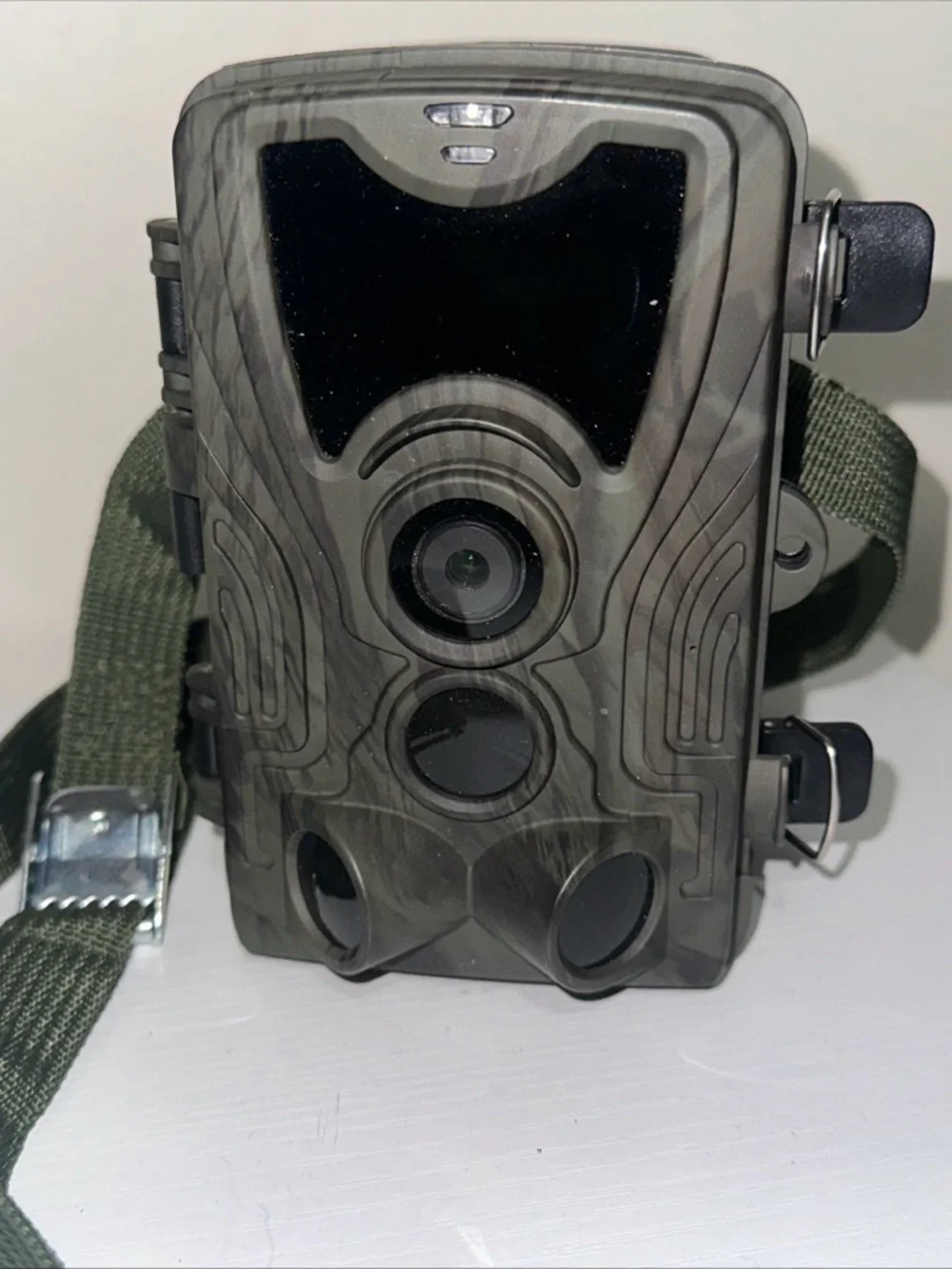 Source Unknown Camouflage Trail Camera with Dark Green Strap